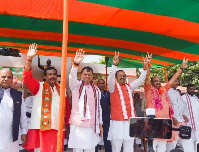 बिहार में सीएम धामी ने आरजेडी और कांग्रेस पर साधा निशाना
